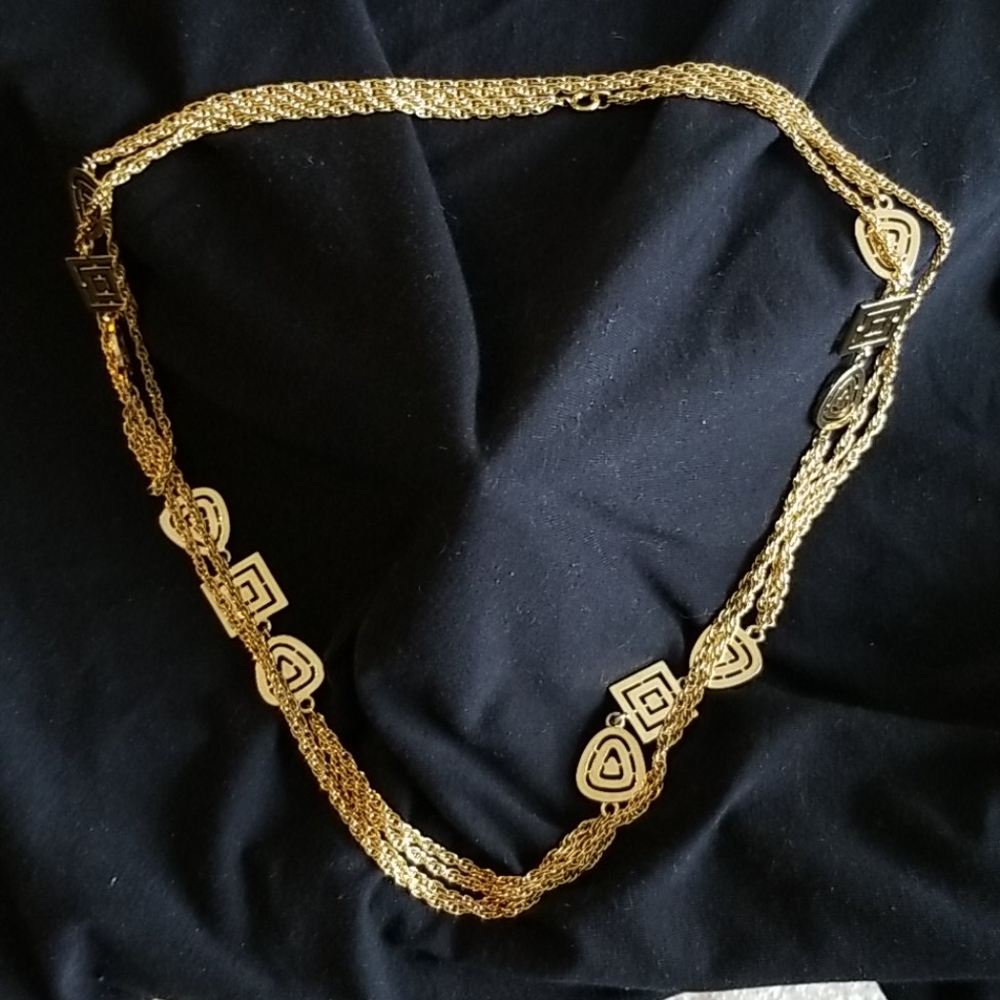 Long gold necklace